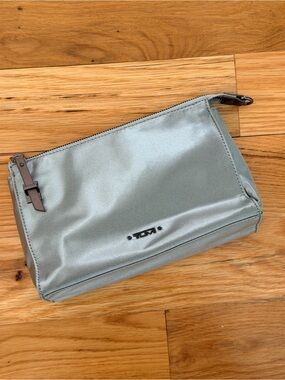 Tumi Silver Satin clutch